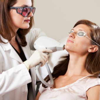 woman receives laser hair removal